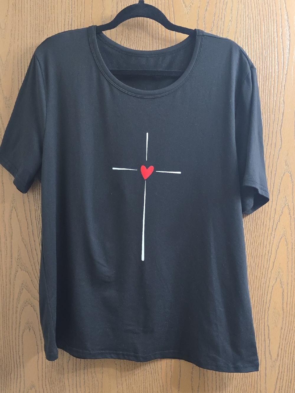 Black Graphic Tee with White Cross and Red Heart